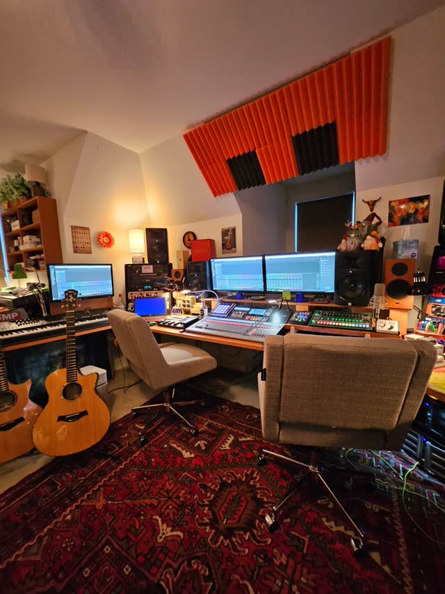 The console and monitors from the other side of the room.